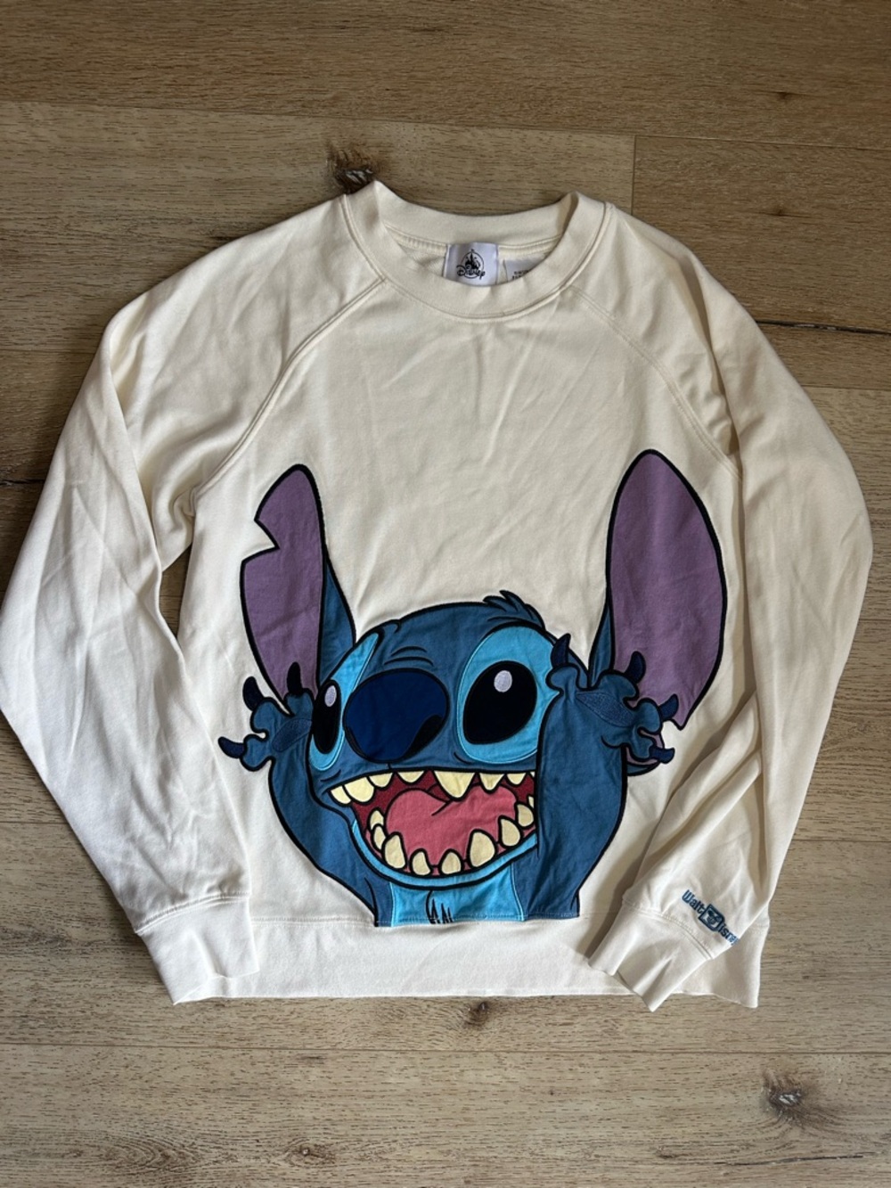 Disney Cream Sweatshirt with Large Blue Stitch Graphic